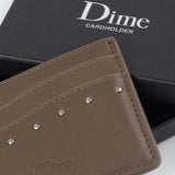 Buy Dime MTL Studded Card Holder Brown. 100% Leather construct. 4 Interior card pockets. Note slots. Embossed Foil logo detailing. Shop the biggest and best range of Dime MTL in the UK at Tuesdays Skate Shop. Fast Free delivery, 5 star customer reviews, Secure checkout & buy now pay later options at Tuesdays Skate Shop.