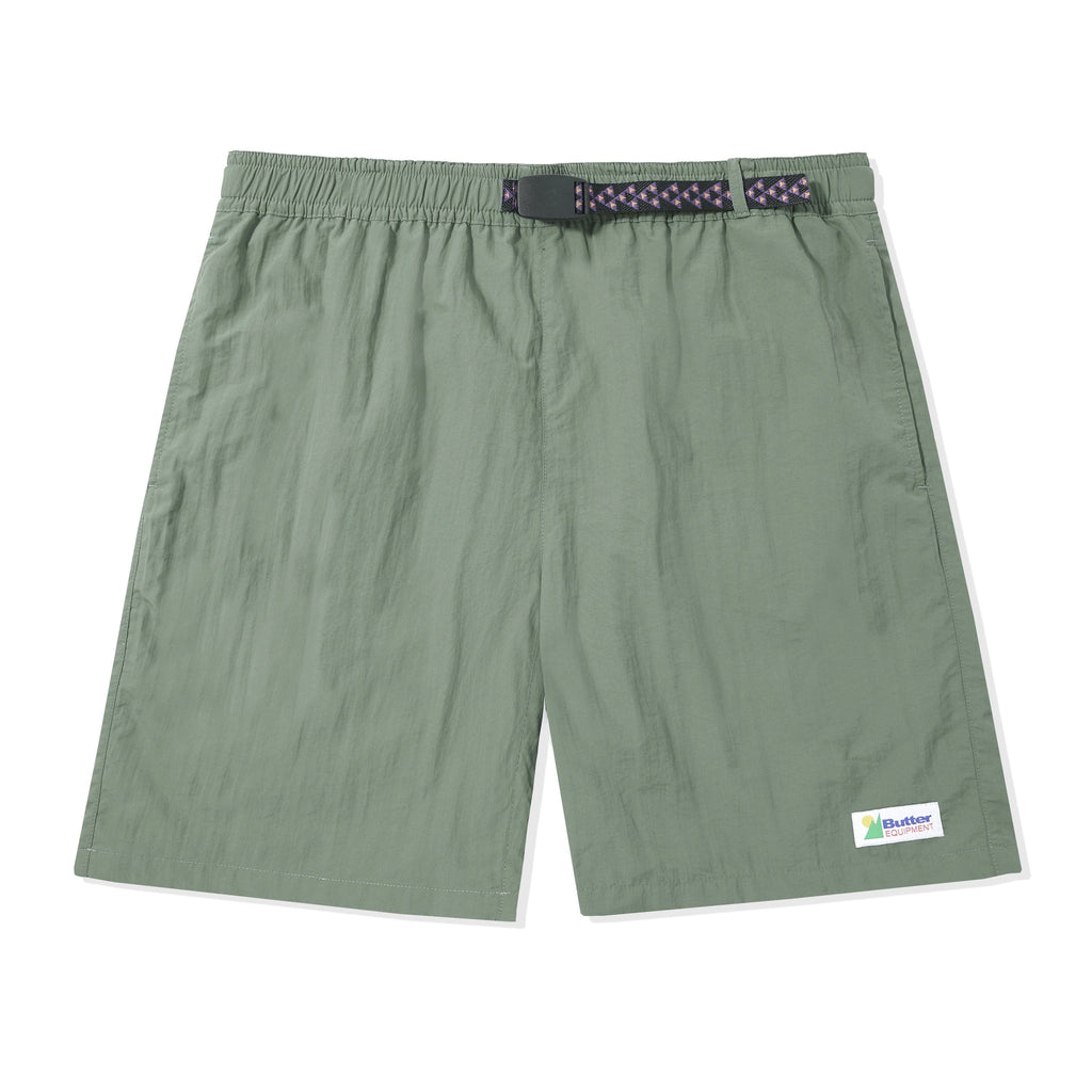 Butter Goods Equipment Shorts Sage. 100% Nylon construct. Custom patterned Woven belt closure. Slash side pockets with single flat pocket at back. Woven tab label detail on leg. Sits above knee. Shop the best range of Buttergoods in the UK at Tuesdays Skate shop, Fast Free UK delivery, Buy now pay later and multiple secure payment methods at checkout.