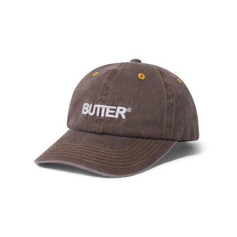 Buy Butter Goods Rounded Logo 6 Panel Cap Washed Oakwood. Distressed washed cotton 6 panel construct. Contrast stitching. Embroidered details on front. Self fabric strap closure at back. Fast free UK Delivery & Buy now pay later at Tuesdays. #1 UK destination for Butter Goods in the U.K.