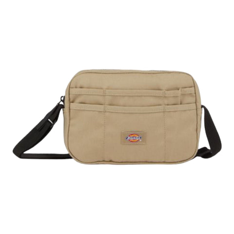 Buy Dickies Moreauville Messenger Bag Khaki. 65% polyester/35% Cotton construct, Strong Poly Cotton. Ideal essentials everyday bag or Festival ready. Dimensions : 24 CM X 20 CM X 5 CM. Multiple front pockets with Internal stash pocket. Shop the best range of Skateboard bags. side bags, hip bags and accessories at Tuesdays Skateshop. Fast Free delivery options and buy now pay later. Highly rated on trustpilot and multiple secure checkout options. 40.00 GBP. DK0A4YYIKHK1