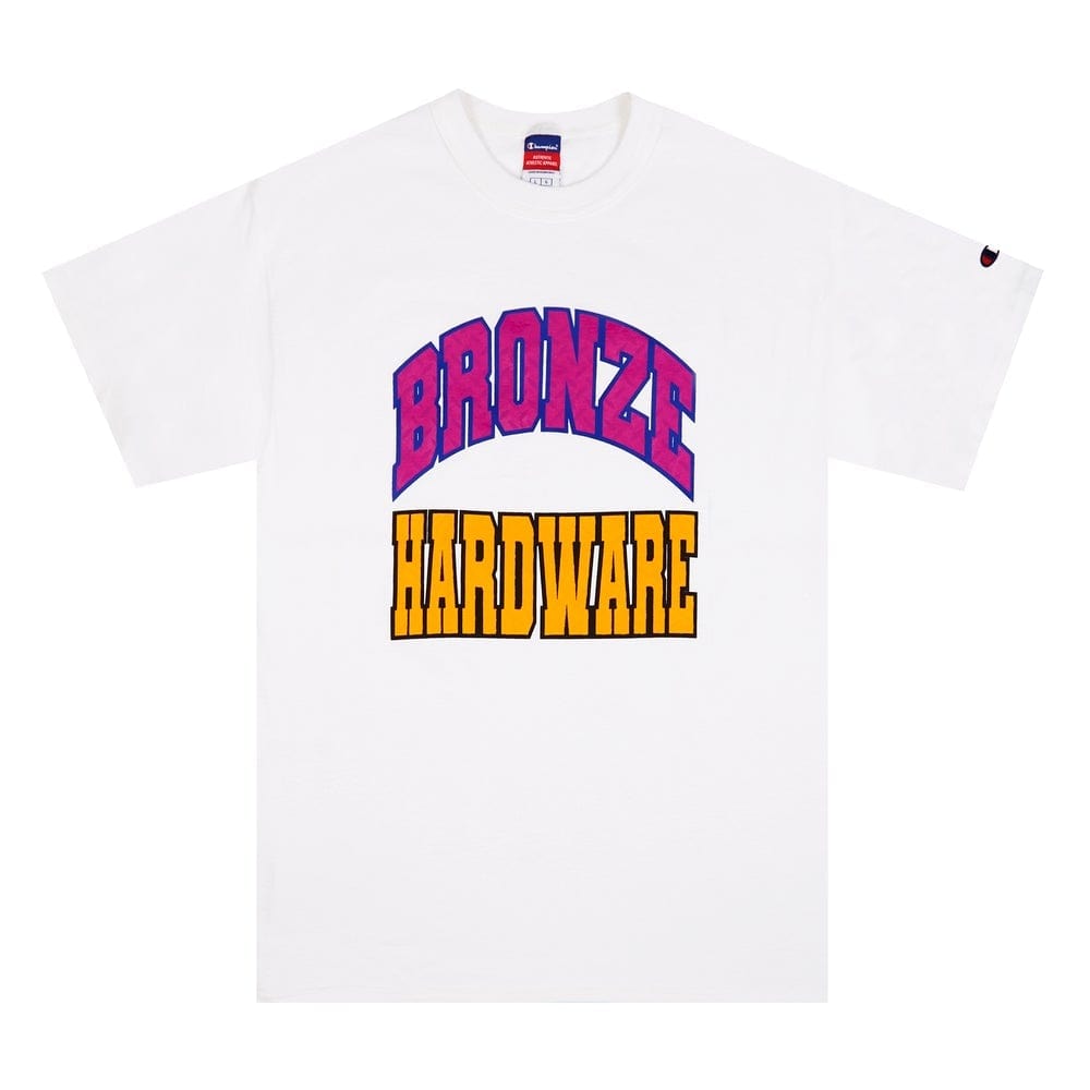 Buy Bronze 56k Varsity Arc T-Shirt in White. 100% Cotton construct. Front print detailing. Regular cut/fit. Size guide for Bronze56k. #1 Destination for Bronze in the UK at Tuesdays Skateshop, Bolton. Fast Free delivery and Multiple secure checkout options. Buy now pay later with Klarna or ClearPay.