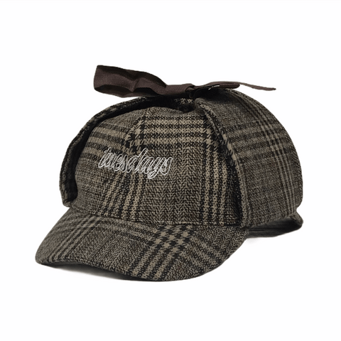 Buy Tuesdays Exploration Deer Stalker Hat Tweed. Soft 6 Panel construct, Silky Nylon lining. Approx fit 54-55 CM with slight flex. Top bow ear flap fastening. Contrast white stitch, Tuesdays Classic script embroidery. Fast Free UK and Europe Delivery/Shipping options. Buy Now pay Later with Klaran or Clearpay | Tuesdays Skate Shop | Bolton Greater Manchester United Kingdom.