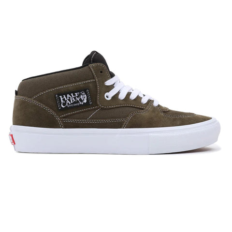 Buy Vans Skate Half Cab Dark Olive VN0AFCDDOL1. Remodelled for a longer lasting wear. Classic Silhouette constructed with heavy Suede panelling. New checkerboard tab detail. Red Vans Skateboarding Heel Tab. Fast Free UK delivery options. Best for Vans Skateboarding at Tuesdays. Buy now pay later with Klarna & ClearPay. Bolton, Greater Manchester. UK.
